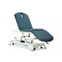 Brancard d'examen hydraulique : trois corps, type fauteuil, avec porte-rouleau, coiffe faciale et roues escamotables