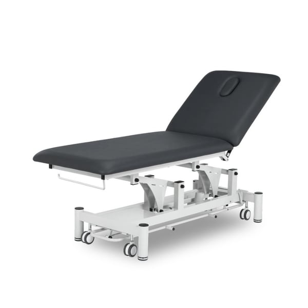 Table de traitement électrique Kinefis Polaris à deux sections : dotée d’un dossier inclinable très stable avec deux pistons et d’une barre périphérique pour le réglage en hauteur. Couleur : Gris graphite
