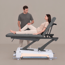 Table de traitement de physiothérapie électrique SWOP 2L EVO à 2 sections et chauffage intégré Table de traitement de physiothérapie électrique SWOP 2L EVO à 2 sections et chauffage intégré